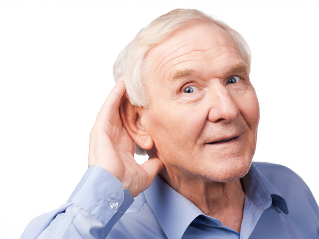 elderly man holding his hand behind his ear
